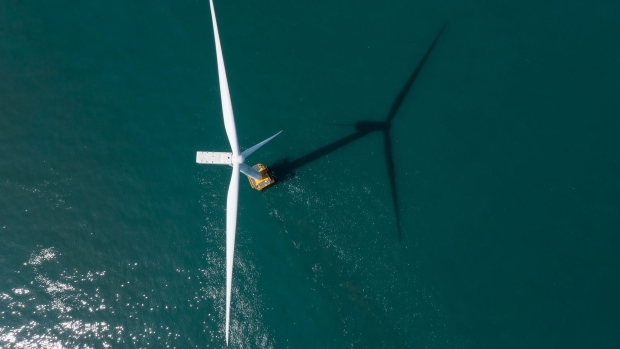 A wind turbine operates at Southwest Offshore Wind Farm in Buan, South Korea, on Thursday, March 25, 2021. The wind farm complex in the Southwest Sea will be expanded to 2.46 GW after 2027, according to Korea Offshore Wind Power Corp, a special purpose company formed by state-run Korea Electric Power Corp. and six other generators. Photographer: SeongJoon Cho/Bloomberg