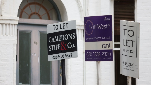 Estate agent "To Let" and "Rent" signs outside a residential properties in the Queen's Park district of London, UK, on Thursday, June 30, 2022. UK house prices slowed more than expected this month after a series of interest-rate increases raised the cost of mortgages. Photographer: Hollie Adams/Bloomberg