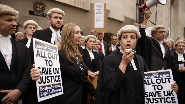 Criminal lawyers protest outside the Old Bailey courts in central London, in June. Photographer: Jason Alden/Bloomberg