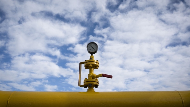 A pressure gauge on yellow pipework at a gas storage facility. Photographer: Oliver Bunic/Bloomberg