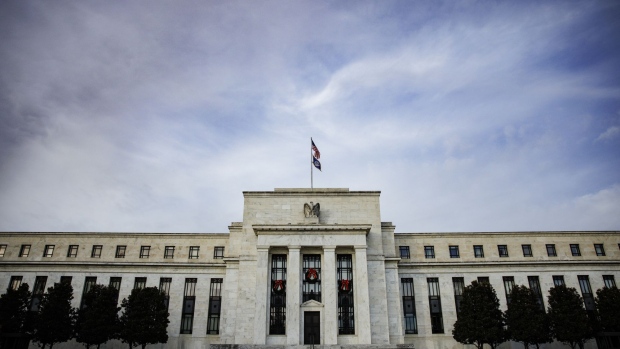 The Marriner S. Eccles Federal Reserve building in Washington, D.C., U.S., on Saturday, Nov. 20, 2021. The Federal Reserve looks on course to consider a more rapid drawdown of its mammoth bond-buying program just weeks after it instituted a plan to scale the purchases back in a methodical manner. Photographer: Samuel Corum/Bloomberg