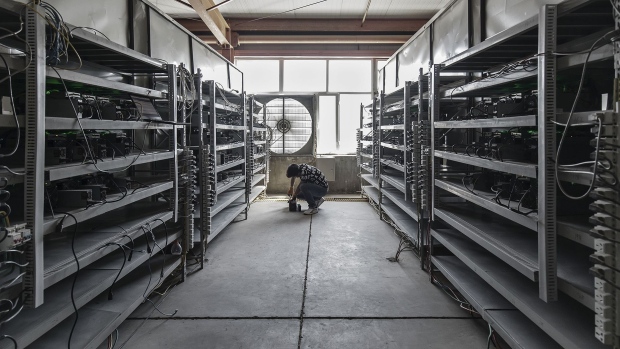 Bitmain mining machines at a Canada Computational Unlimited Inc. computation center in Joliette, Quebec, Canada, on Friday, Sept. 10, 2021. CCU.ai, a Bitcoin mining center powered by hydroelectricity, has been conditionally approved for trading on the TSX Venture Exchange in Toronto under the stock symbol SATO.