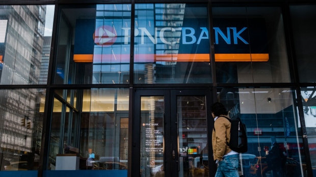 Pedestrians pass in front of a PNC Financial Services Group Inc. bank branch in New York, U.S., on Saturday, Jan. 11, 2020. PNC Financial Services Group Inc. is scheduled to release earnings figures on January 15. Photographer: Gabriela Bhaskar/Bloomberg