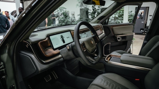 The interior of the Rivian R1T electric vehicle (EV) pickup truck at the company's manufacturing facility in Normal, Illinois, US., on Monday, April 11, 2022. Rivian Automotive Inc. produced 2,553 vehicles in the first quarter as the maker of plug-in trucks contended with a snarled supply chain and pandemic challenges.