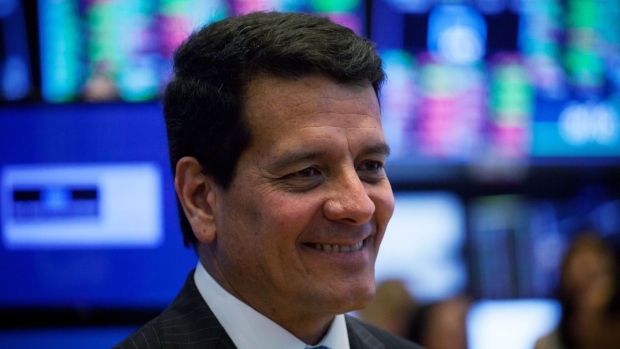 Felipe Bayon, chief executive officer of Ecopetrol SA, smiles on the floor of the New York Stock Exchange (NYSE) in New York, U.S., on Friday, Aug. 24, 2018. U.S. stocks rose, while the dollar deepened losses and Treasuries turned higher after the Federal Reserve chair signaled the central bank has no intention of accelerating the pace of rate hikes.