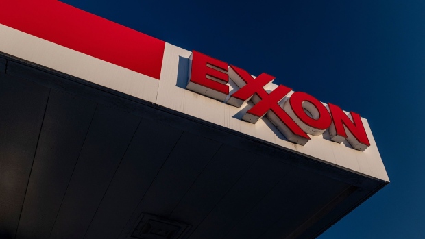 Signage at an Exxon Mobil gas station in El Cerrito, California, U.S., on Tuesday, July 27, 2021. Exxon Mobil Corp. is expected to release earnings figures on July 30. Photographer: David Paul Morris/Bloomberg