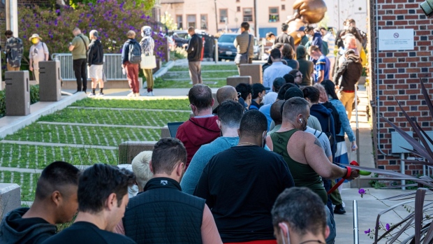 Residents wait in line outside Zuckerberg San Francisco General Hospital And Trauma Center to receive a monkeypox vaccination in San Francisco, California, US, on Tuesday, Aug. 9, 2022. Governor Newsom declared a state of emergency over the rapidly spreading monkeypox outbreak on Monday.