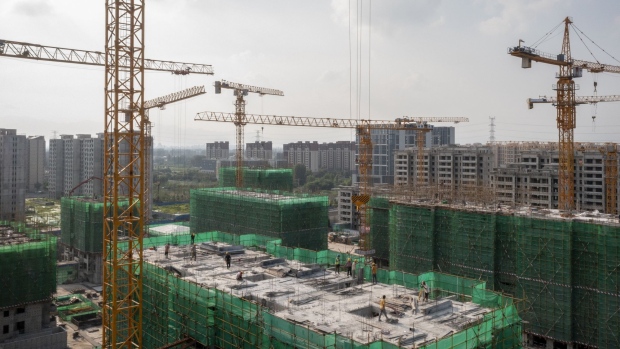 The China Evergrande Group Royal Peak residential development under construction in Beijing, China, on Friday, July 29, 2022. A mild rally in Chinese developers’ dollar bonds appears to be losing momentum, as investors express disappointment that a top leadership meeting failed to unveil stronger policy support for the crisis-ridden industry.