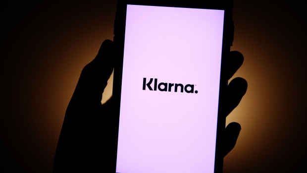 A Klarna logo on a mobile phone. Photographer: Hollie Adams/Bloomberg