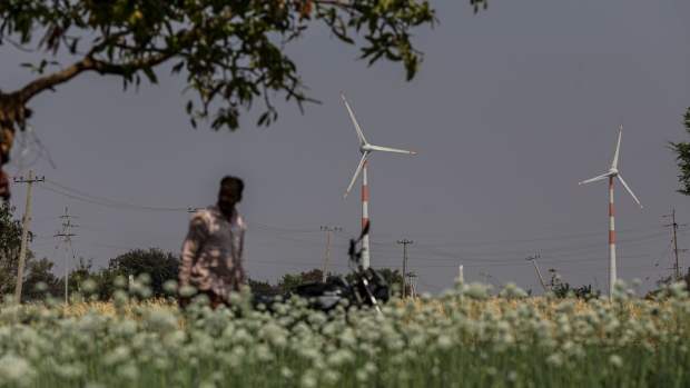 Turbines operate at a wind farm in Hubli, Karnataka, India. Photographer: Dhiraj Singh/Bloomberg