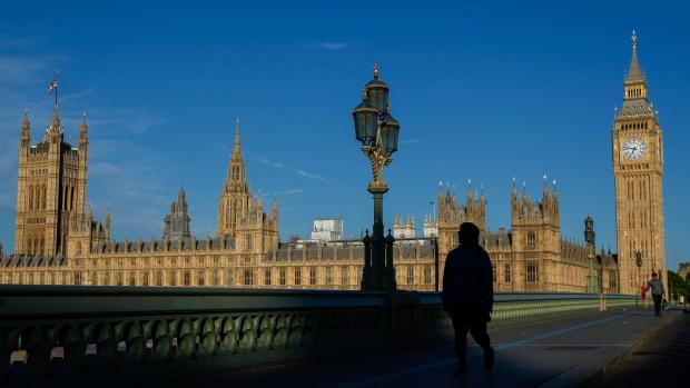 The Palace of Westminster, the meeting place of the Houses of Parliament and Westminster Bridge in London, UK, on Monday, June, 20, 2022. The chairman of Boris Johnson's ruling Conservatives resigned after the party lost two key parliamentary seats in one night, raising fresh concerns about Johnson’s leadership and his faltering popularity with voters.