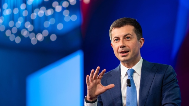 Pete Buttigieg, U.S. secretary of transportation, speaks during the U.S. Conference of Mayors winter meeting in Washington, D.C., U.S., on Thursday, Jan. 20, 2022. Several House Democrats promise to sink the White House's economic agenda if a scaled-back version now being considered eliminates an expansion of the federal deduction for state and local taxes.