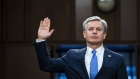 Christopher Wray, director of the Federal Bureau of Investigation (FBI), is sworn-in during a Senate Judiciary Committee hearing in Washington, D.C., US, on Thursday, Aug. 4, 2022. The hearing is titled "Oversight of the FBI."