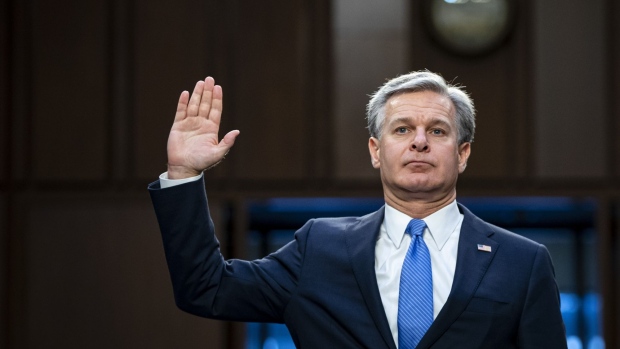 Christopher Wray, director of the Federal Bureau of Investigation (FBI), is sworn-in during a Senate Judiciary Committee hearing in Washington, D.C., US, on Thursday, Aug. 4, 2022. The hearing is titled "Oversight of the FBI."