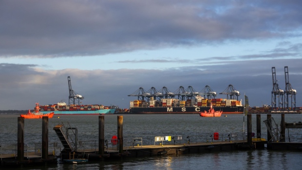 The A.P. Moller-Maersk A/S Kotka container ship, left, and the MSC Regulus container ship at the Port of Felixstowe Ltd. in Felixstowe, U.K., on Thursday, Jan. 20, 2022. The Danish carrier AP Moller-Maersk A/S has been overtaken by Mediterranean Shipping Co. in terms of capacity, according to data compiled by Alphaliner Photographer: Chris Ratcliffe/Bloomberg