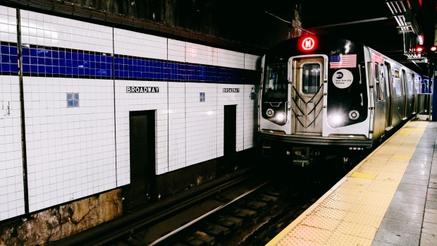 An M train arrives at the Broadway-Lafeyette Street subway station in New York, U.S., on Tuesday, April 13, 2021. New York's Metropolitan Transportation Authority (MTA), the largest U.S. public transit system, plans to sell $1.3 billion of bonds next week that will be repaid with a payroll tax, the first time the agency is offering long-term debt backed by that revenue. Photographer: Nina Westervelt/Bloomberg
