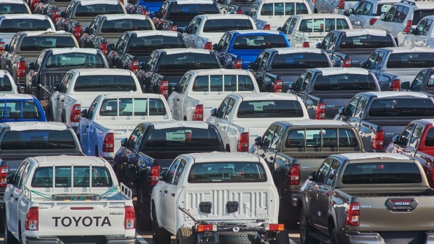 Lines of new Hilux automobiles in a parking lot ahead of distribution at the Toyota Motor Corp. manufacturing plant in Durban, South Africa, on Tuesday, Aug. 16, 2022. Floods earlier in the year caused extensive damage to the Toyota plant, one of the country's biggest car manufacturers.