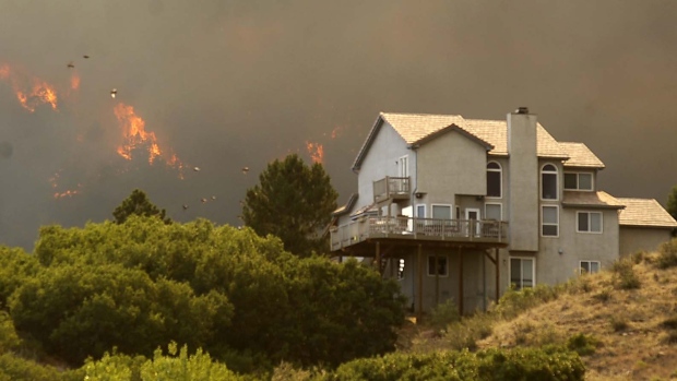 The Waldo Canyon fire invades the Mountain Shadows neighborhood of Colorado Springs, Colorado Tuesday, June 26, 2012.
