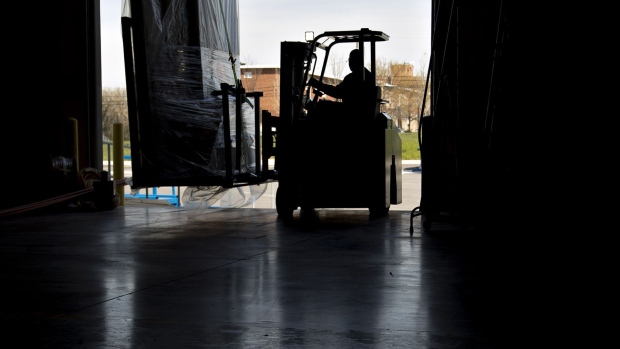 An employee moves an order of walls on a forklift in Baltimore, Maryland. Photographer: Andrew Harrer/Bloomberg