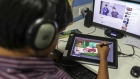 An employee draws a cartoon for the BYJU'S learning app in the media department of the Think and Learn Pvt. office in Bengaluru, India, on Wednesday, April 5, 2017. Online learning is exploding in India, and no company is poised to benefit more than BYJU'S. Its app has been downloaded 8 million times, and more than 400,000 students are paying an annual fee of 10,000 rupees (just over $150) in a country not known to pay for subscriptions of any kind.