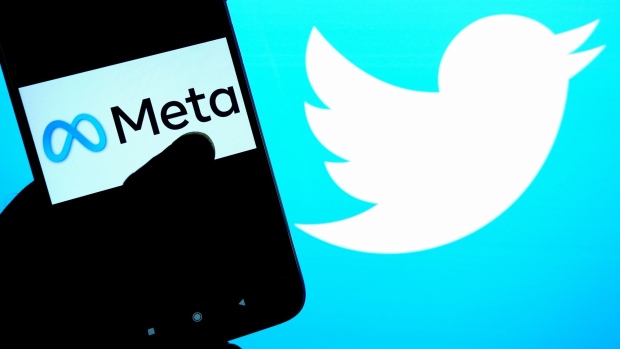 In this photo illustration, a Meta logo is seen displayed on a smartphone with a Twitter logo in the background. Photographer: Avishek Das/SOPA Images/LightRocket/Getty Images