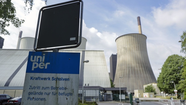 Signage for Uniper SE at an entrance to the Scholven coal-fired power plant in Gelsenkirchen, Germany, on Saturday, May 21, 2022. S&P Global Ratings last week downgraded Uniper to the lowest investment grade level, a move that could prompt lenders to restrict access to credit and peers to demand more collateral to back trades.