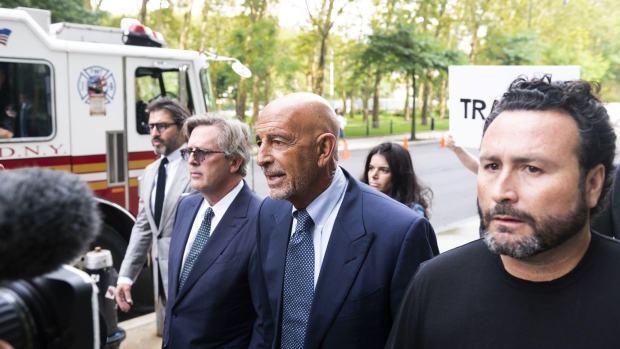 Tom Barrack Jr., center, arrives at criminal court in New York, on July 26, 2021.