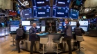 Traders work on the floor of the New York Stock Exchange (NYSE) in New York, U.S., on Thursday, Oct. 11, 2018. U.S. stocks fell for a sixth day, extending the longest losing streak of Donald Trump's presidency, as energy shares plunged and a rally in tech failed to lift the broader market.