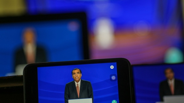 Mukesh Ambani, chairman and managing director of the Reliance Industries Ltd., speaks via live stream during the annual general meeting in Mumbai, India, on Monday, Aug. 29, 2022. Reliance will invest 2 trillion rupees ($25 billion) to roll out its 5G services in October across the largest Indian cities, its billionaire-chairman Mukesh Ambani said as he continues to expand and diversify the $221 billion empire. Photographer: Dhiraj Singh/Bloomberg