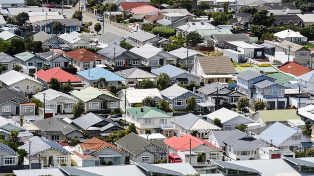 Houses in the Lyall Bay suburb of Wellington, New Zealand, on Saturday, Nov. 28, 2020. A housing frenzy at the bottom of the world is laying bare the perils of ultra-low interest rates.
