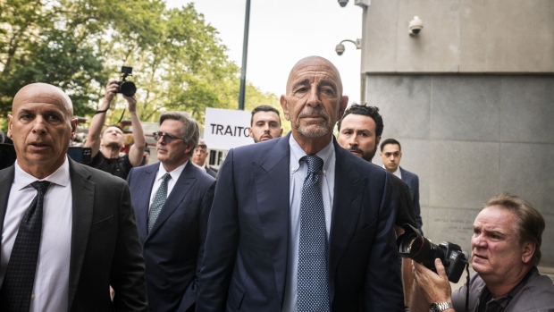 Tom Barrack Jr., founder of Colony Capital Inc., right, arrives at criminal court in New York, U.S., on Monday, July 26, 2021. Barrack and U.S. prosecutors have reached agreement on a bail package that will allow him to be freed ahead of a trial on charges that he illegally lobbied the government on behalf of the United Arab Emirates, according to people familiar with the case.