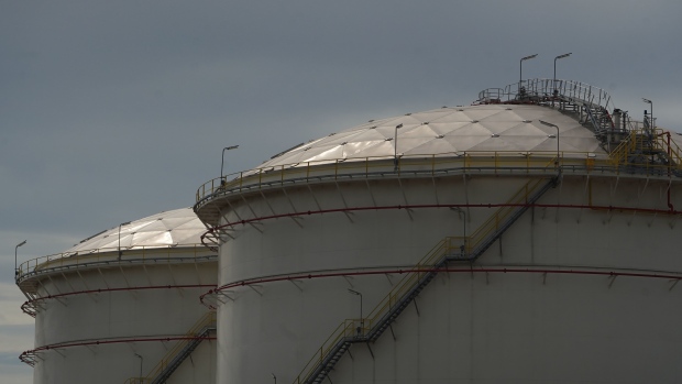 Fuel storage tanks at a PT Pertamina facility at Tanjung Priok Port in Jakarta, Indonesia, on Thursday, Feb. 24, 2022. Oil surged above $100 a barrel for the first time since 2014 as Russia attacked sites across Ukraine, triggering fears of a disruption to energy exports at a time of already tight supplies. Photographer: Dimas Ardian/Bloomberg