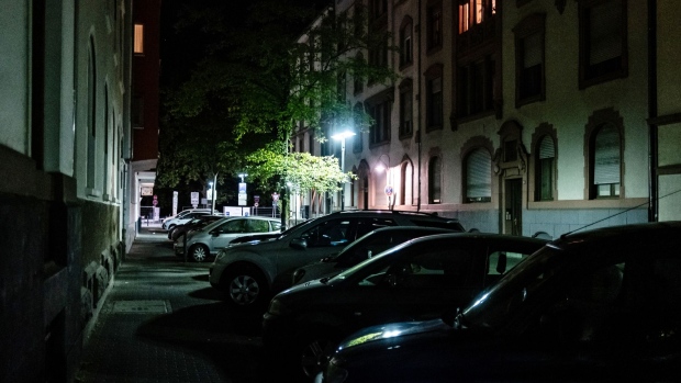 Illuminated street lamps in a residential street on the outskirts of Frankfurt, Germany, on Thursday, Sept. 1, 2022. German Economy Minister Robert Habeck said the country can't rely on gas supplies from Russia, as Europe braces for energy shortages this winter.