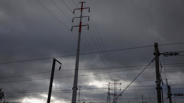 Electricity transmission towers in Vila Franca de Xira, Portugal, on Wednesday, April 6, 2022. Portugal said it’s discussing an electricity price cap with neighboring Spain to help protect households and businesses from soaring energy costs.