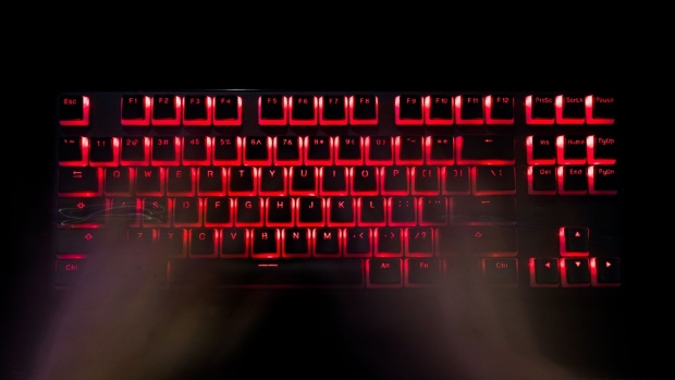A person types at a backlit keyboard. Photographer: Chris Ratcliffe/Bloomberg