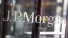The JPMorgan Chase & Co. logo on a door. Photographer: Andrew Harrer/Bloomberg
