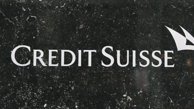 A logo outside the Credit Suisse Group AG headquarters in Zurich, Switzerland, on Monday, Nov. 1, 2021. Credit Suisse's third-quarter numbers might only be a sideshow this time around as the bank is set to provide investors with a new strategy and outline the way it wants to move past the scandals that troubled the Swiss lender over the past year. Photographer: Thi My Lien Nguyen/Bloomberg