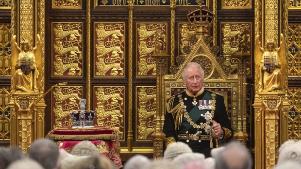LONDON, ENGLAND - MAY 10: Prince Charles, Prince of Wales sits by the Imperial State Crown as he delivers the Queen’s Speech during the state opening of Parliament at the House of Lords on May 10, 2022 in London, England. The State Opening of Parliament formally marks the beginning of the new session of Parliament. It includes Queen's Speech, prepared for her to read from the throne, by her government outlining its plans for new laws being brought forward in the coming parliamentary year. This year the speech will be read by the Prince of Wales as HM The Queen will miss the event due to ongoing mobility issues. (Photo by Dan Kitwood/Getty Images)