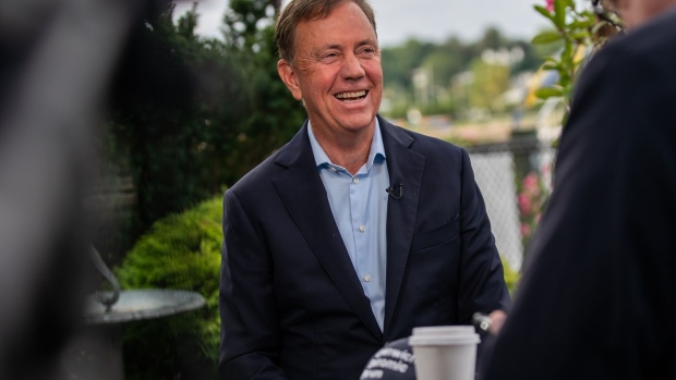 Ned Lamont, governor of Connecticut, smiles during a Bloomberg Television/Radio interview at the Greenwich Economic Forum (GEF) in Greenwich, Connecticut, U.S., on Tuesday, Sept. 21, 2021. The GEF brings together leaders in global finance, business, media and government for global investment forums to discuss the economic implications of the defining issues of our times.