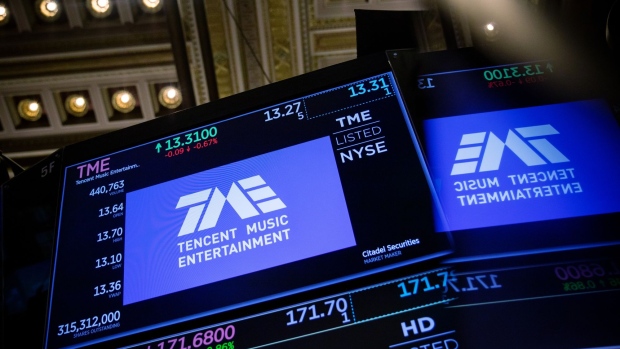 A monitor displays Tencent Music Entertainment Group signage on the floor of the New York Stock Exchange (NYSE) in New York, U.S., on Monday, Dec. 31, 2018. U.S. stocks erased gains in thin trading on the final day of what is shaping up to be the worst year since the financial crisis.