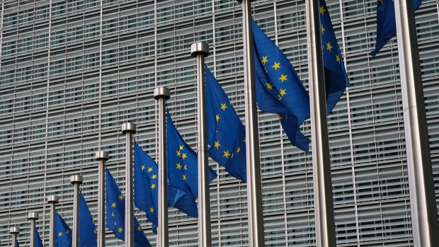 Flags of the European Union (EU) fly outside the Berlaymont building, headquarters of the European Commission (EC), in Brussels, Belgium, on Wednesday, Jan. 16, 2019. “There is not an awful lot to say today because we don’t know what our British friends are going to do after the vote in Parliament yesterday,” Margaritis Schinas, spokesman for the European Commission, told reporters in Brussels. Photographer: Yuriko Nakao/Bloomberg