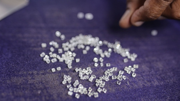 Rough diamonds on a sorting table in Moscow. Photographer: Andrey Rudakov/Bloomberg