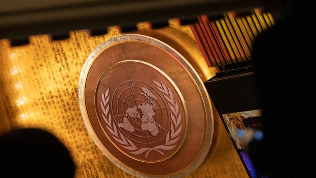 The United Nations (UN) seal at the headquarters in New York, US, on Monday, Sept. 19, 2022. US President Biden, UK Prime Minister Truss and New Zealand Prime Minister Ardern are among the heads of state attending this year after Covid-19 moved the gathering online in 2020 and limited the in-person event in 2021. Photographer: Jeenah Moon/Bloomberg