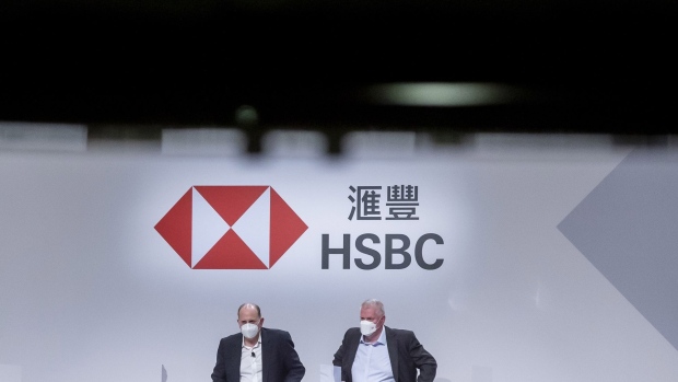 Noel Quinn, right, at an HSBC Holdings Plc shareholders meeting in Hong Kong, on Aug. 2. Photographer: Paul Yeung/Bloomberg