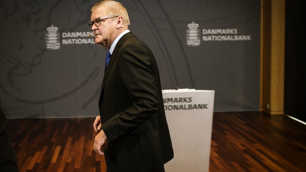 Lars Rohde, governor of Denmark's central bank, exits after speaking at a news conference at the bank's headquarters in Copenhagen, Denmark, on Wednesday, Sept. 13, 2017. "We have previously seen that the economy can overheat vigorously and suddenly when it is booming,” Rohde said in a statement on Wednesday. Photographer: Carsten Snejbjerg/Bloomberg