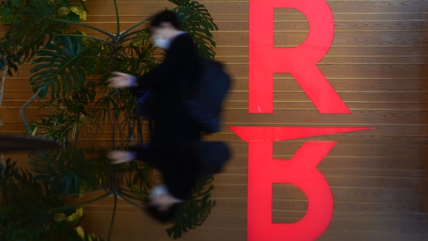 The logo of Rakuten Group Inc. at the company's head office in Tokyo, Japan, on Friday, Feb. 18, 2022. About 11% of the Japanese population had received a third dose of the vaccine as of Tuesday, according to Bloomberg data.