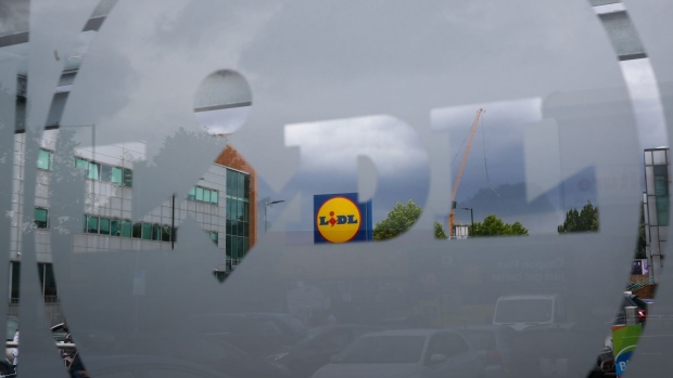 A logo outside a Lidl Ltd. supermarket in London, UK, on Friday, June 24, 2022. The Office for National Statistics said Friday the volume of goods sold in stores and online fell 0.5% in May, as soaring food prices forced consumers to cut back on spending in supermarkets. Photographer: Hollie Adams/Bloomberg