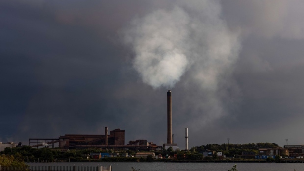 Emissions being released by a chimney at the steel plant, operated by Tata Steel Ltd., in Port Talbot. Photographer: Hollie Adams/Bloomberg