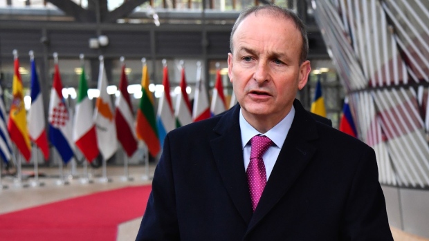 Michael Martin, Ireland’s prime minister, speaks to journalists as he arrives at a European Union (EU) leaders summit in Brussels, Belgium, on Thursday, Dec. 10, 2020. EU leaders will likely approve today a landmark stimulus package, after Germany brokered a compromise with Hungary and Poland to lift their veto over the deal.