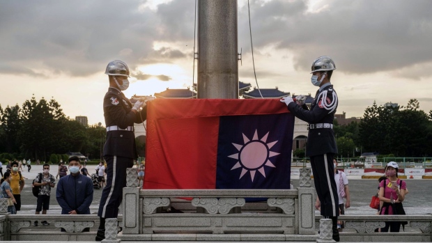 The flag lowering ceremony at the Chiang Kai-shek Memorial Hall in Taipei, Taiwan, on Saturday, July 2, 2022. The dispute over Taiwan's sovereignty is the main issue that risks one day leading to war between the US and China, with calls growing among American politicians for a commitment to get involved if Beijing invades the island.